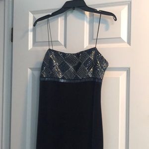 Beautiful formal velvet dress with sequins upfront.